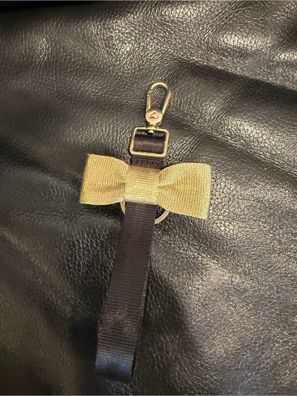 Harvey’s NYE Gold Bow Black Strap Keychain Charm